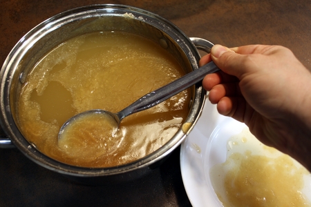 Fat that has risen to the broth's surface